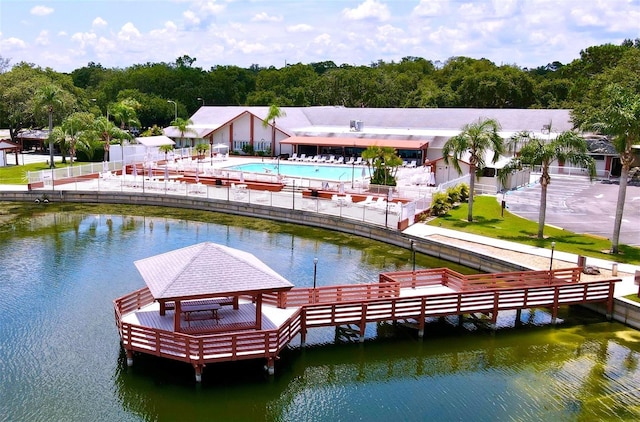 dock area with a gazebo and a water view