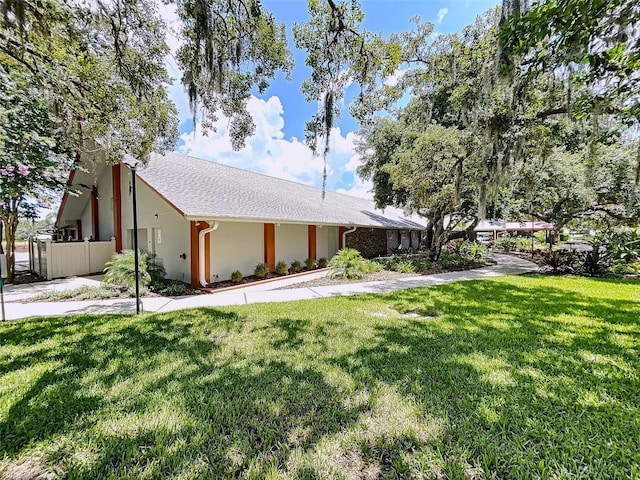 exterior space featuring a lawn