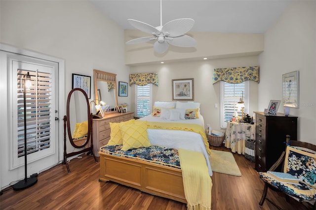 bedroom featuring access to exterior, ceiling fan, dark hardwood / wood-style flooring, and high vaulted ceiling