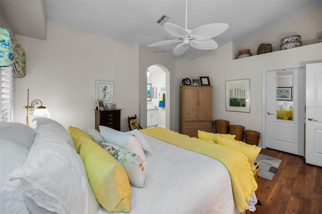 bedroom with ceiling fan and dark hardwood / wood-style floors