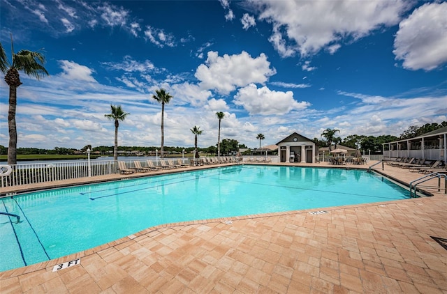 view of swimming pool with a patio