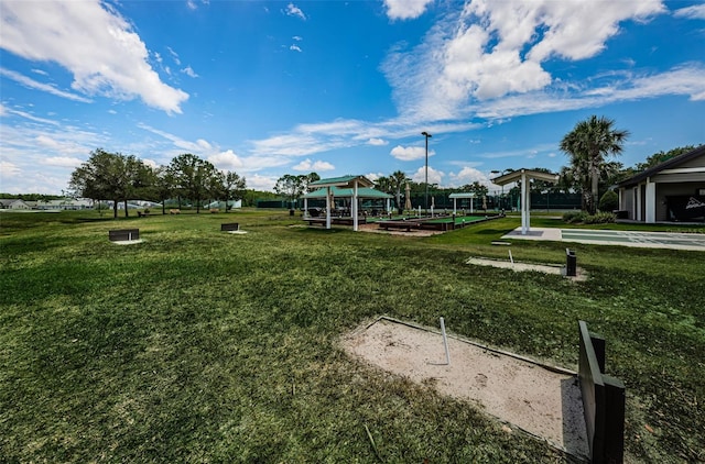 exterior space featuring a gazebo and a yard