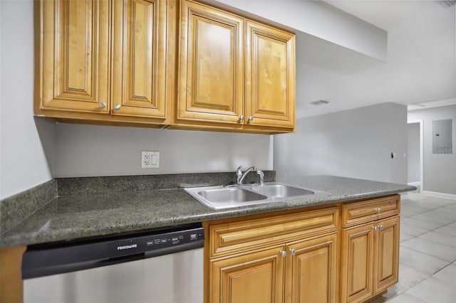 kitchen featuring dishwasher, light tile patterned floors, and sink