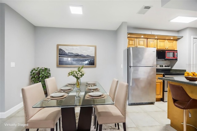 view of tiled dining room