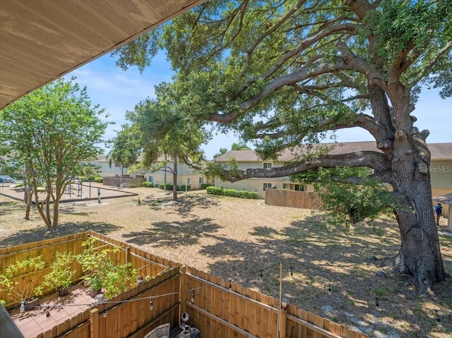 view of yard with fence