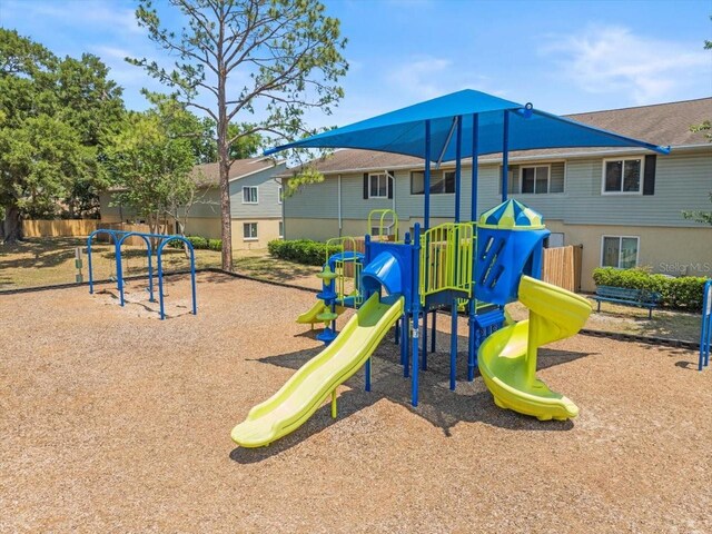 community play area featuring fence