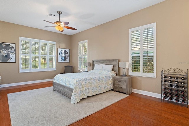 bedroom featuring ceiling fan and wood-type flooring