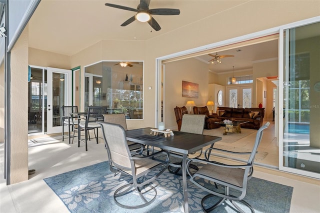 exterior space with ceiling fan, french doors, and a healthy amount of sunlight