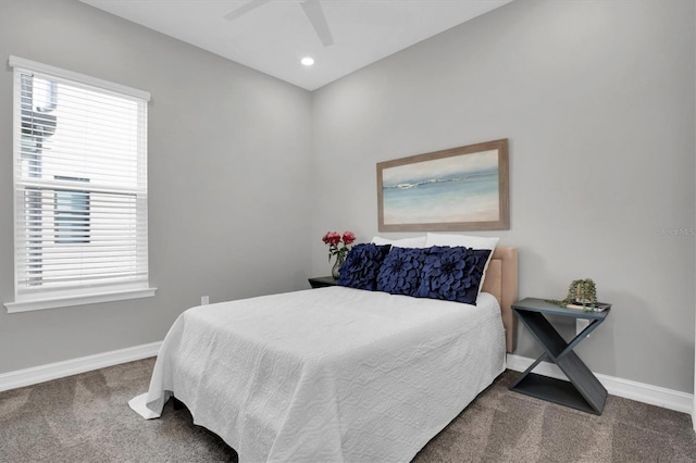 bedroom with ceiling fan and carpet