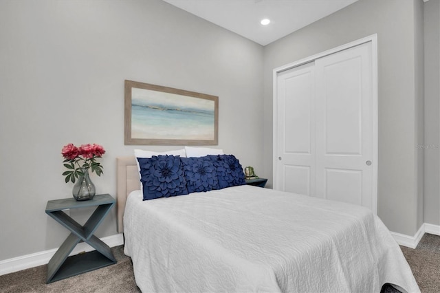 carpeted bedroom with a closet