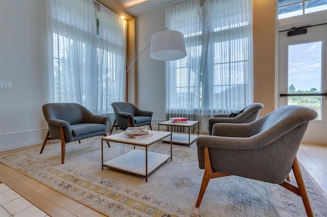 sitting room featuring light hardwood / wood-style floors