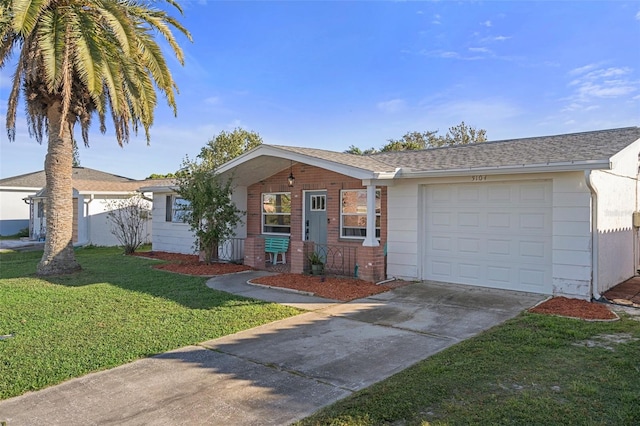 single story home with a garage and a front yard