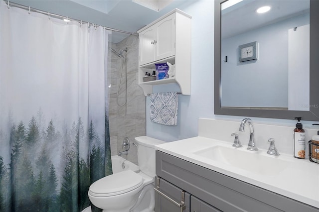 full bathroom with vanity, toilet, and shower / bath combo with shower curtain