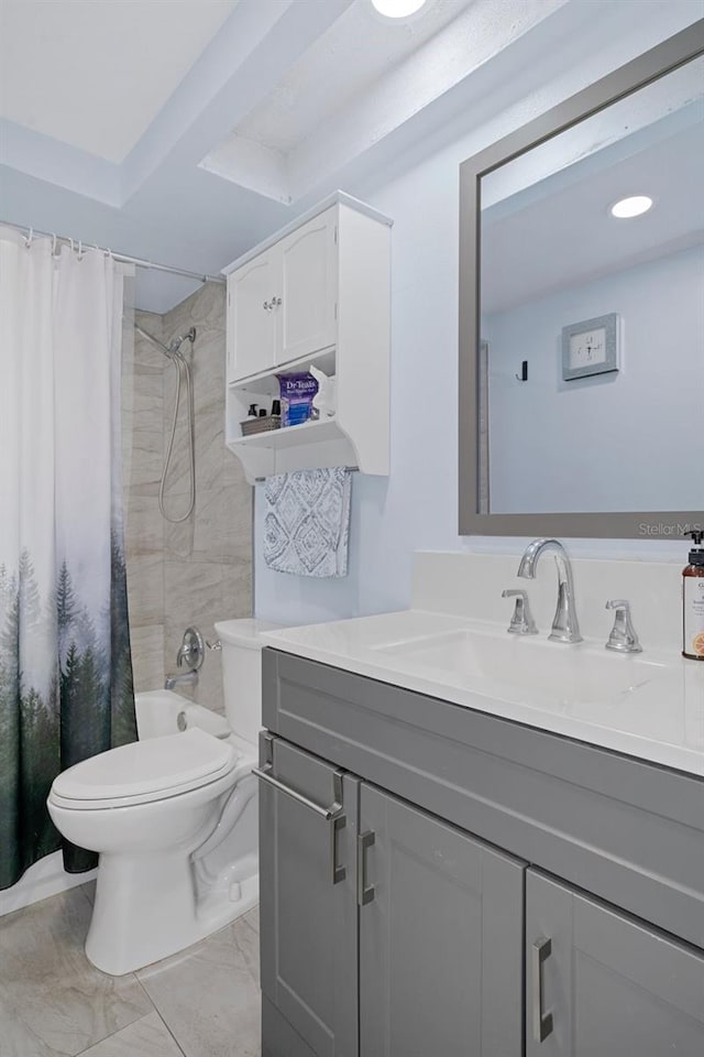 full bathroom featuring vanity, toilet, and shower / bathtub combination with curtain