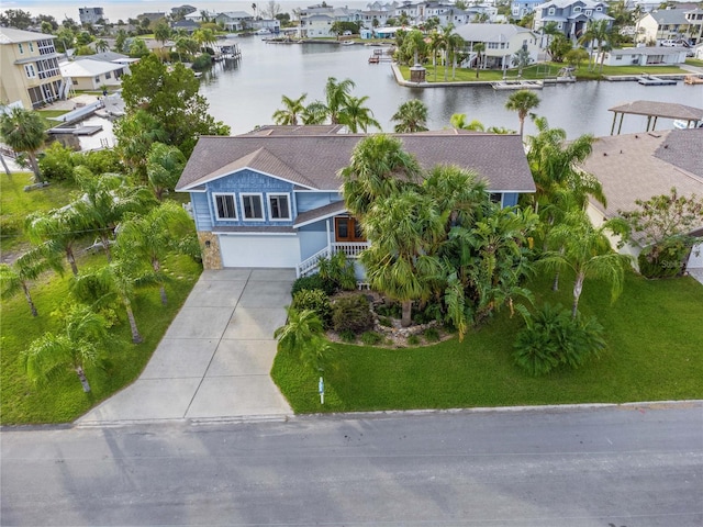 bird's eye view with a water view