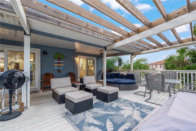 wooden terrace featuring an outdoor living space