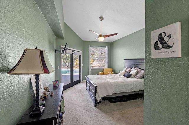 bedroom featuring access to exterior, ceiling fan, french doors, carpet floors, and vaulted ceiling