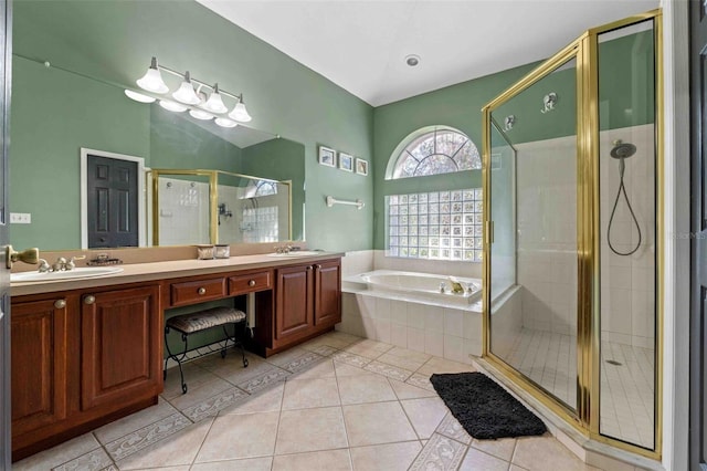 bathroom featuring separate shower and tub, tile patterned flooring, and vanity