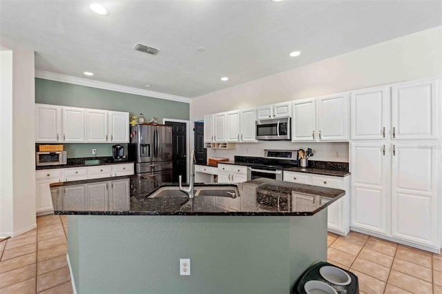 kitchen with white cabinets and stainless steel appliances