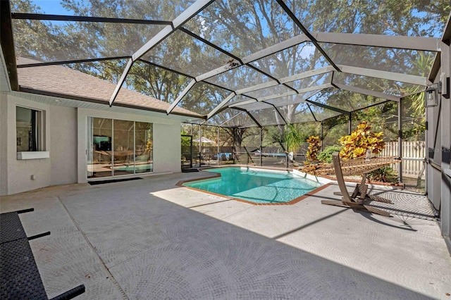 view of pool featuring a lanai and a patio