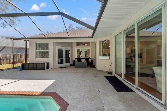 exterior space featuring french doors and a swimming pool