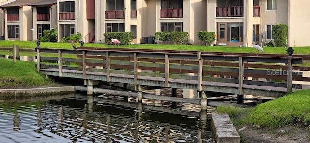 view of home's community featuring a water view