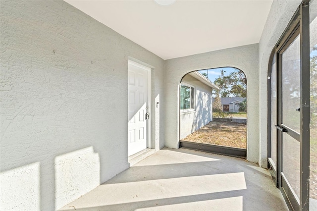 view of unfurnished sunroom