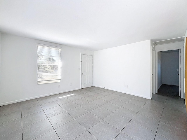 view of tiled spare room