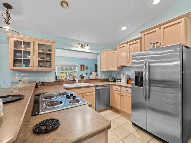 kitchen with light brown cabinets, sink, vaulted ceiling, appliances with stainless steel finishes, and decorative light fixtures