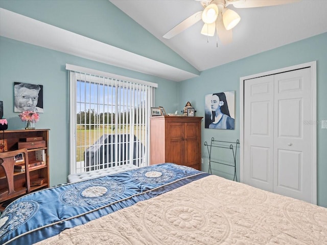 bedroom with ceiling fan, a closet, access to outside, and vaulted ceiling