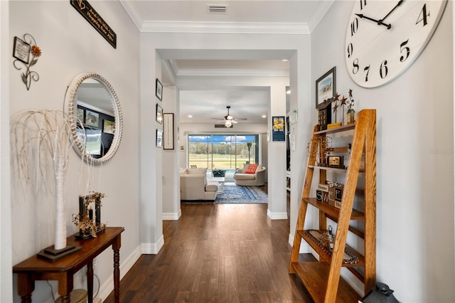 corridor featuring crown molding and dark wood-type flooring