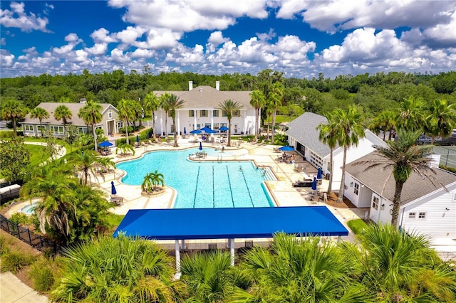 view of swimming pool with a patio