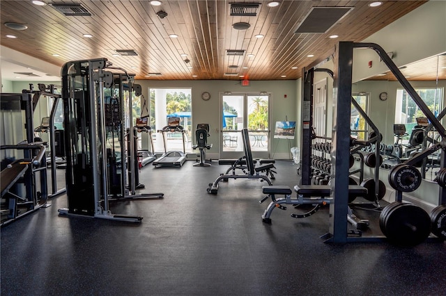 exercise room featuring wood ceiling