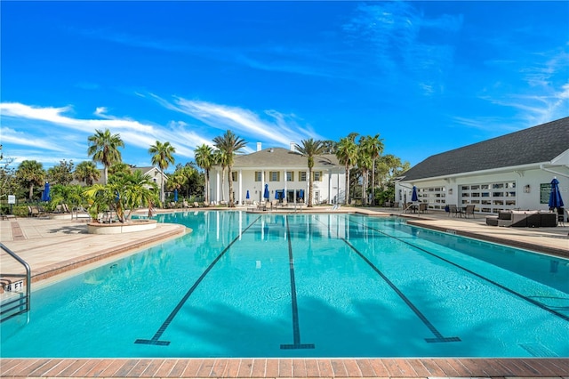 view of pool featuring a patio area