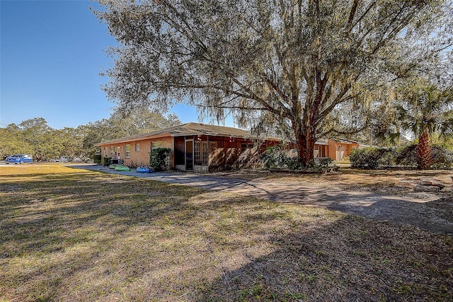 exterior space featuring a yard