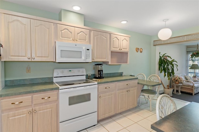 kitchen with light brown cabinets, white appliances, hanging light fixtures, and light tile patterned floors