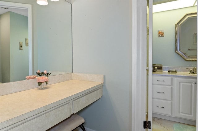 bathroom with tile patterned flooring and vanity