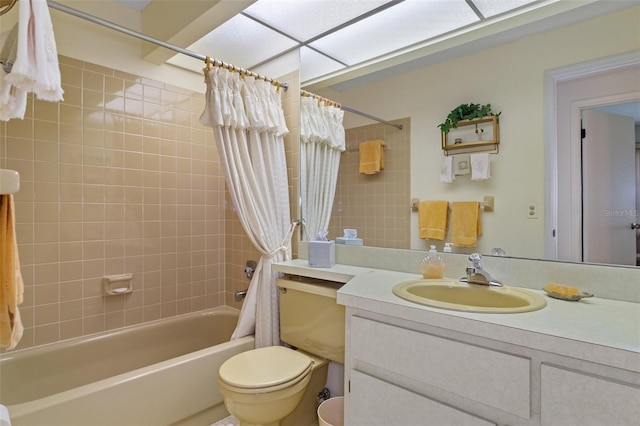 full bathroom with toilet, vanity, and shower / tub combo with curtain