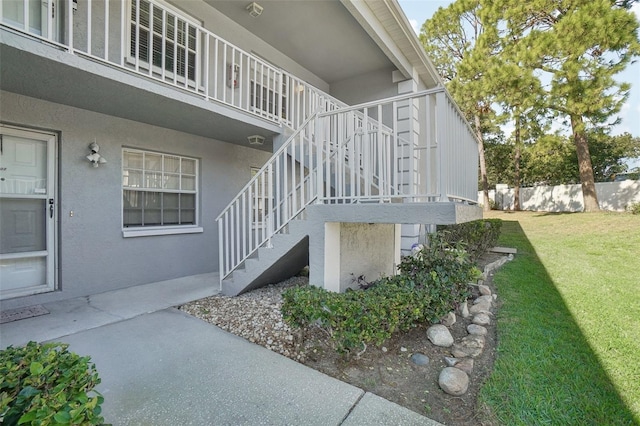 view of side of property featuring a lawn