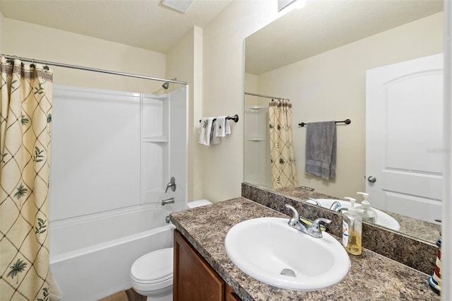 full bathroom with vanity, toilet, and shower / bath combo with shower curtain