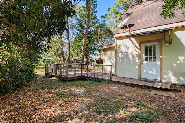 view of yard featuring a wooden deck