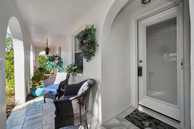 property entrance with covered porch