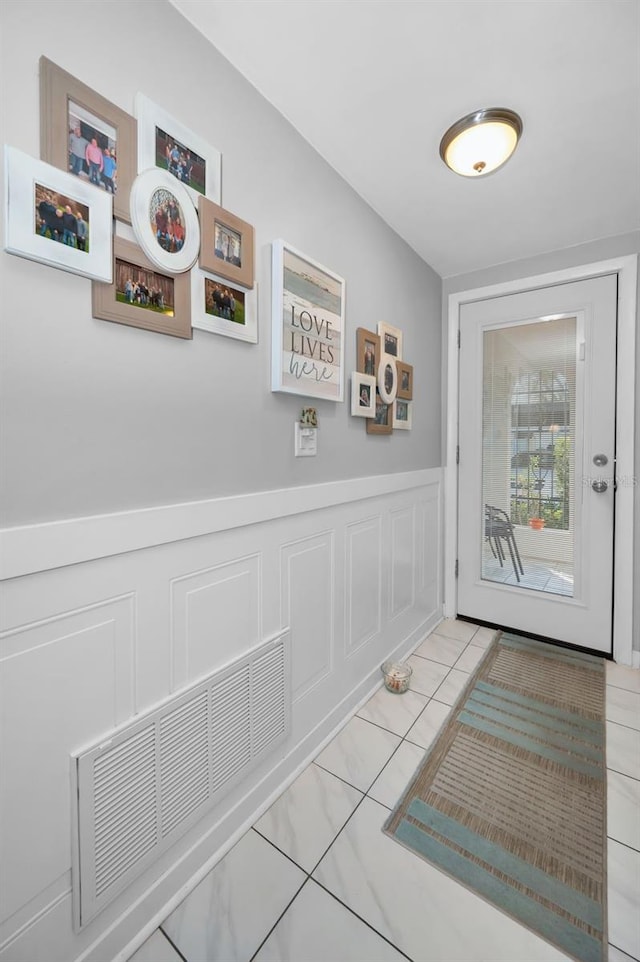 interior space with light tile patterned floors