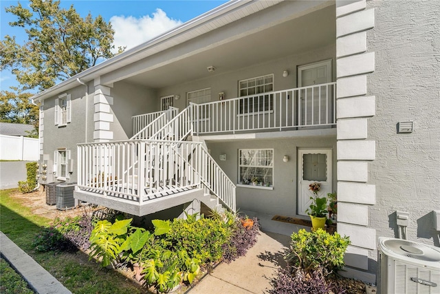 exterior space featuring central AC unit