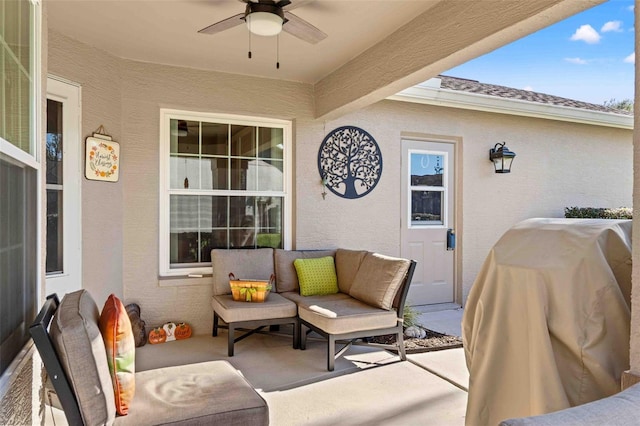 view of patio featuring ceiling fan