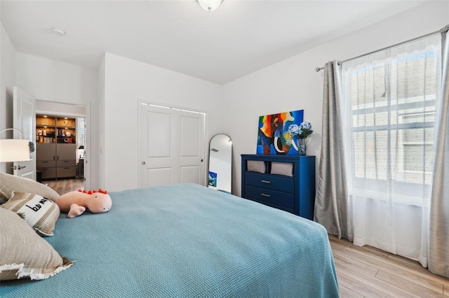 bedroom featuring light wood-type flooring