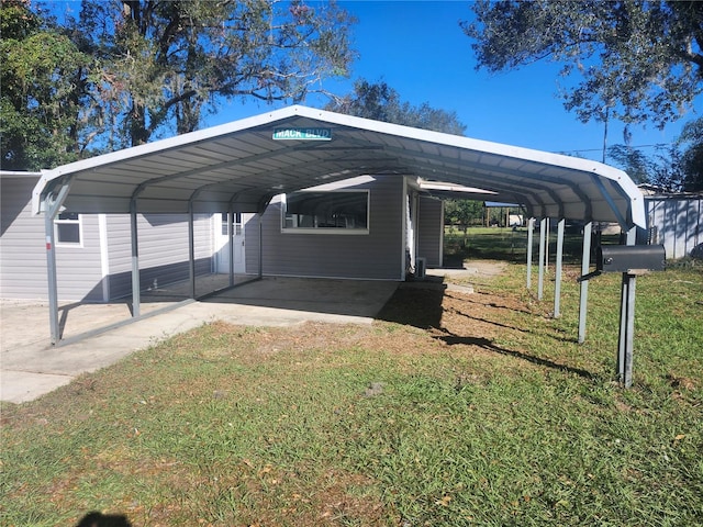 view of car parking featuring a yard and a carport