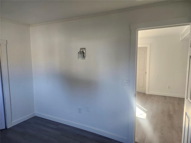 unfurnished room featuring dark hardwood / wood-style floors