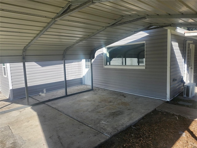 exterior space with a carport