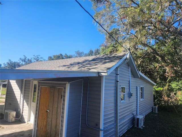 view of outbuilding with central AC unit